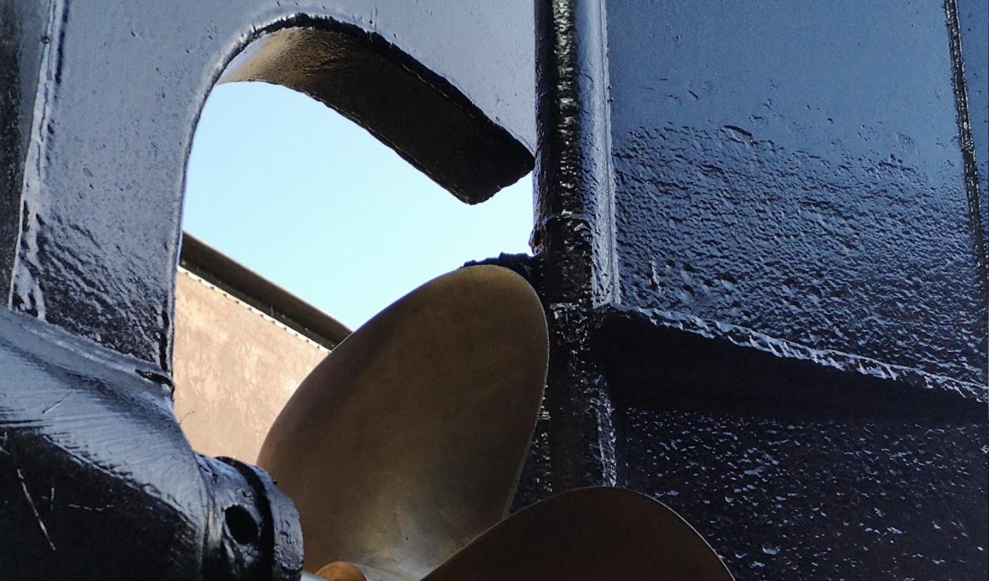 Boat propeller and hull detail